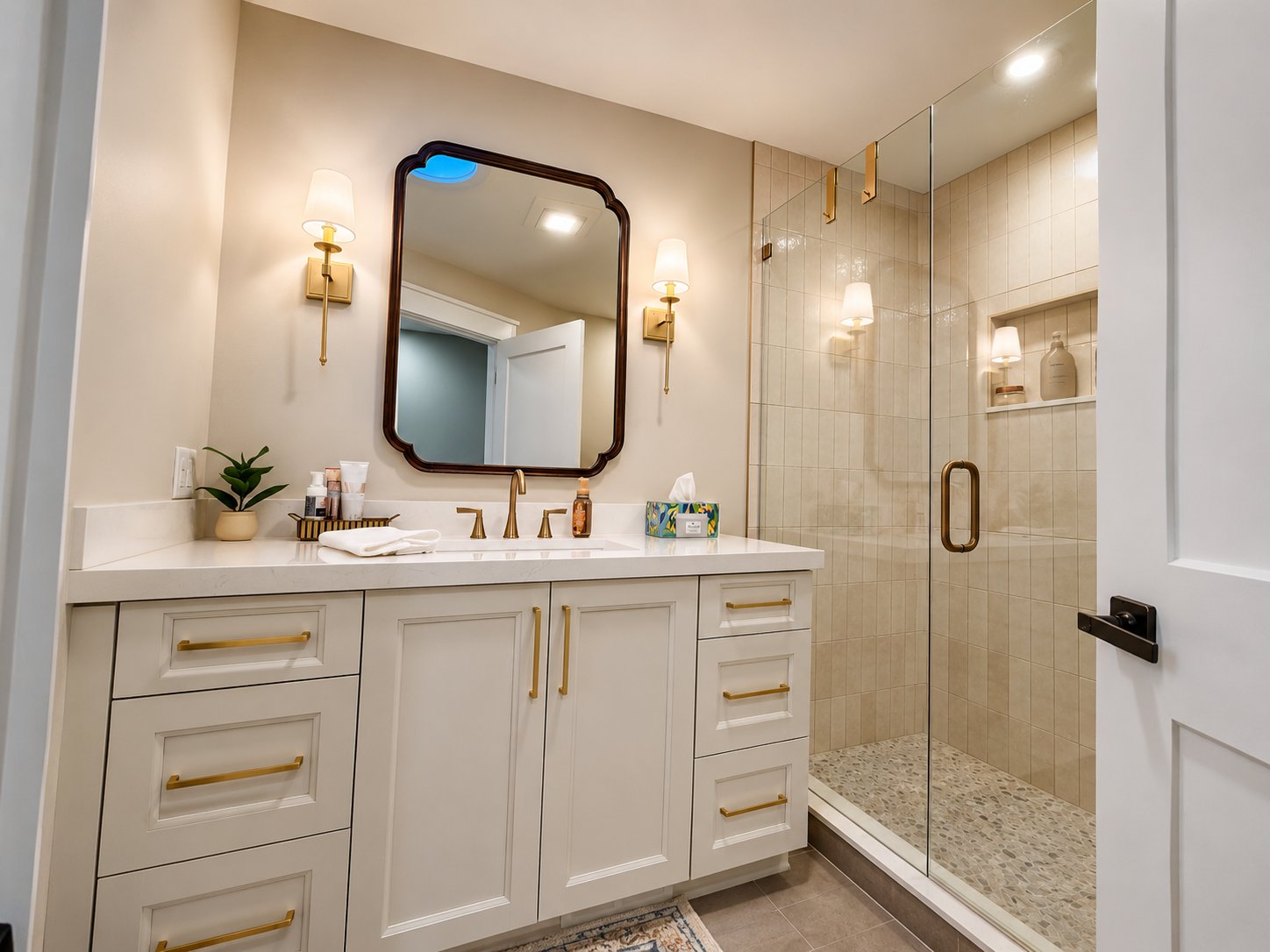Remodeled bathroom with freestanding tub and tile